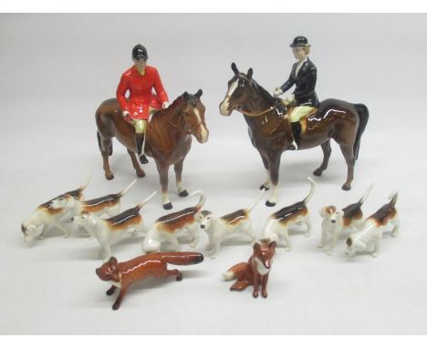 Beswick Hunting group comprising huntsman on horseback, huntswoman on horseback (a/f), 8 hounds and 2 foxes 