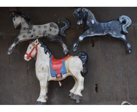 Two 1959s wooden fairground horses and a metal articulated Mobo child's ride on horse. (3) 