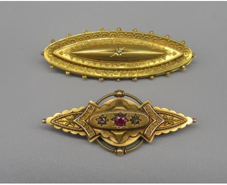 Edwardian yellow gold ornate mourning brooch with clear back panel set with ruby and two diamonds in star settings, worn hall