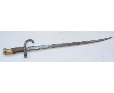 French Model 1874 Gras bayonet with brass hilt and walnut grips. Blade end bent, no scabbard. Blade length 50cm, overall 62.5
