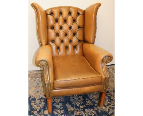 Geo.111 style wing back arm chair, upholstered in light tan leather, with loose seat cushion on square supports, W85cm D80cm 