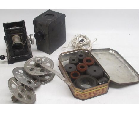 Cine Film reel player with tin of Cine film reel (a/f) 