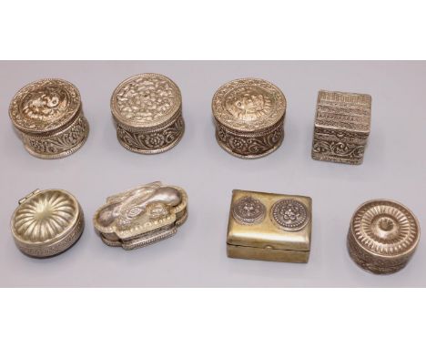 Middle Eastern white metal patch boxes including one with applied wirework decoration, max. D4cm (8) 