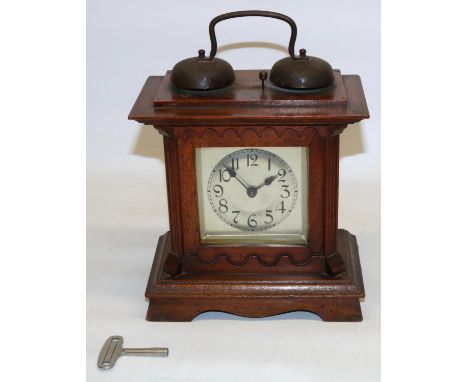 C20th continental stained pine striking mantle clock, pressed silvered Arabic dial with outer minute track, unsigned two trai