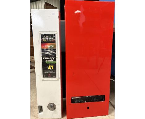 Wall mounted condom dispenser, another wall mounted dispenser, an openwork metal mannequin and a packing tape/wrap dispenser,