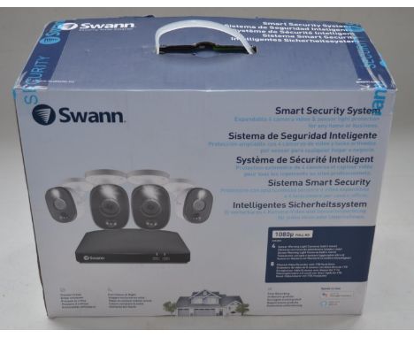 As new/factory sealed Swann Smart Security System for home or business with expandable 4 camera video and sensor light protec