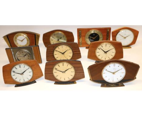 1960's Metamec teak and brass mantle clock with two tone dial on pedestal foot, Kienzle battery movement W27cm and nine other
