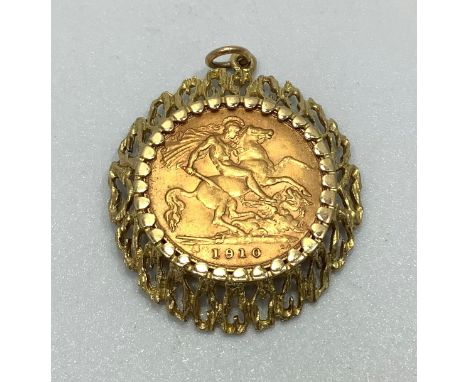 A 22ct gold 1910 half sovereign in a bark effect mount, total weight 6.7 grams. 