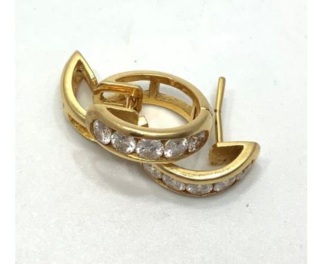 A pair of 18ct yellow gold hoop earrings, each set with 5 x round white stones, total weight 5.4 grams 