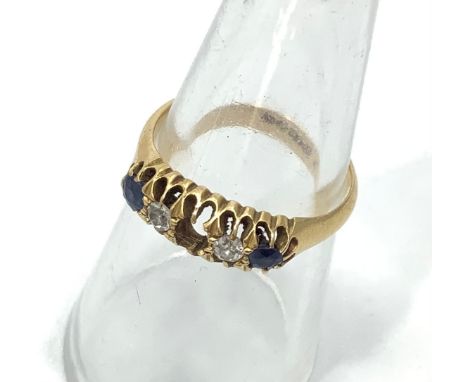 An 18ct yellow gold sapphire and diamond ring, (middle sapphire missing)ring weighs 3.6 grams, finger size P. 