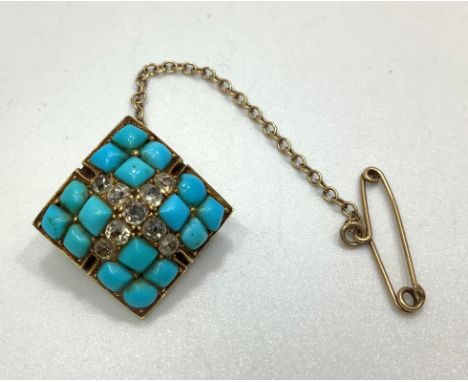 An unmarked 14ct gold, turquoise and diamond brooch, of square form with central cross of nine diamonds set in each corner wi