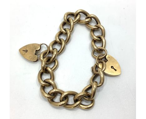 A 9ct yellow gold double padlock large link bracelet, weighing 31.4 grams. 