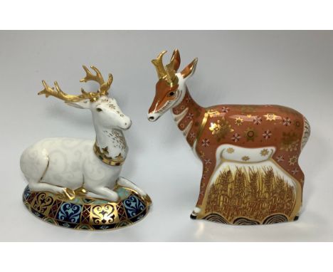 Two Royal Crown Derby paperweights, 'The White Hart Heraldic Stag', limited edition 1223/2000 and 'Pronghorn Antelope' limite