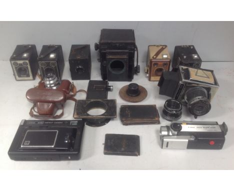 A Thornton Pickard Junior Special camera housing together with four Brownie box cameras, Voigtlander Vito B, Coronet Every an