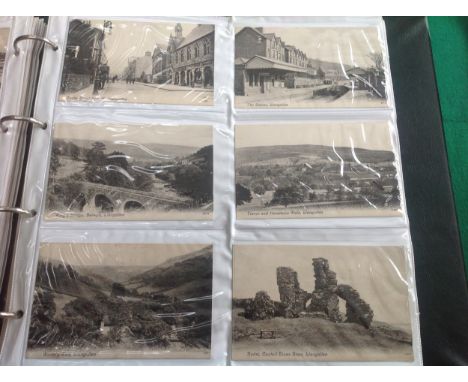 Two albums containing more than 630 standard-size postcards. Album 1 comprises approximately 264 cards, mainly British topogr