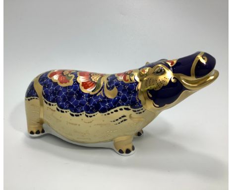 A Royal Crown Derby paperweight, 'Hippopotamus', with printed marks to base and gold stopper, limited edition number 980/2500