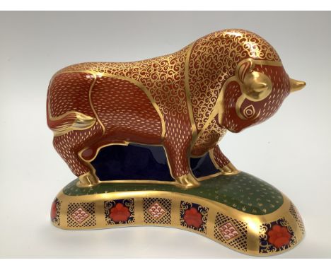 A Royal Crown Derby paperweight, 'Harrods Bull', with printed marks to base and gold stopper, limited edition number 26/400, 