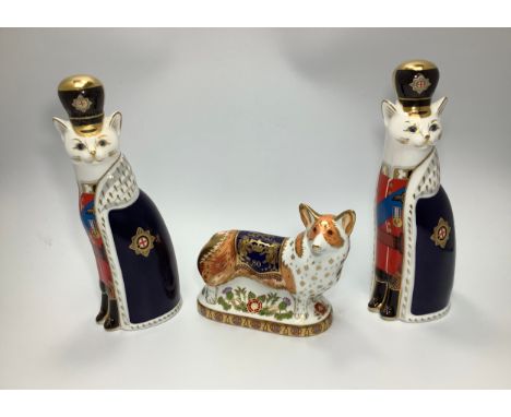 Three Royal Crown Derby paperweights, 'Royal Windsor Corgi', limited edition number 112/950 and two 'Royal Cat Williams' from