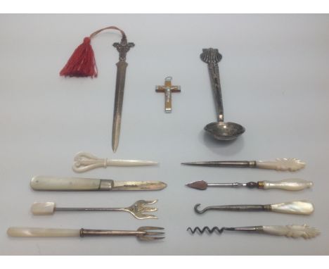 A small quantity of silver and silver plated items including two silver and mother of pearl pickle forks, silver bladed fruit