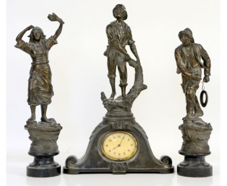 Late 19th/early 20th century French patinated spelter clock garniture modelled with a fisherman holding a net with fish surmo