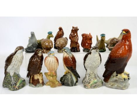 Beswick Beneagles scotch whisky ceramic decanters in the form of eagles, Lock Ness monster, and other creatures.  One Kestrel