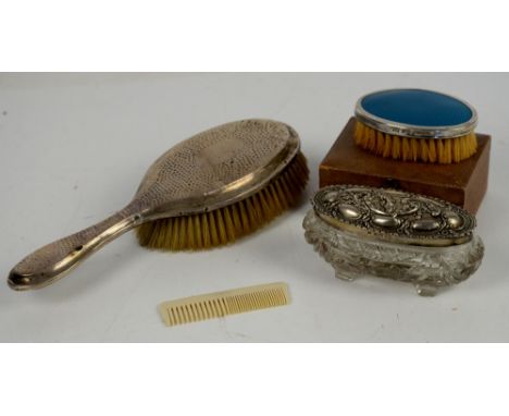 Boxed silver brush and comb christening set, a silver topped trinket dish and a silver backed brush       