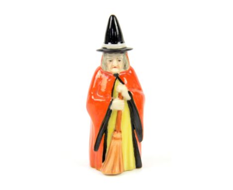 Royal Worcester candle snuffer in the form of a witch, circa 1920, puce marks       Overall condition good, no chips, cracks 