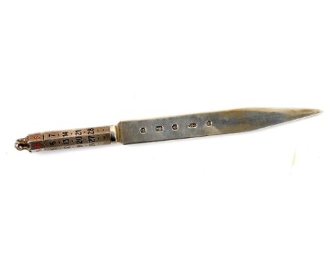 Combination silver and enamel letter opener and calendar by L.J. Millington, the dates in black turn to meet the days of week