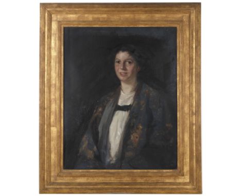 Herbert James Gunn (1893-1964)Portrait of Jenny Mitchell, half length wearing a blue floral robe over a white dress, signed a