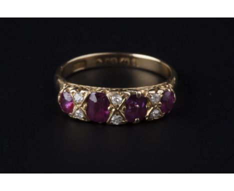 AN EDWARDIAN RUBY AND DIAMOND HALF HOOP RING, set with graduated oval mixed-cut rubies, spaced by pairs of old-cut diamonds, 