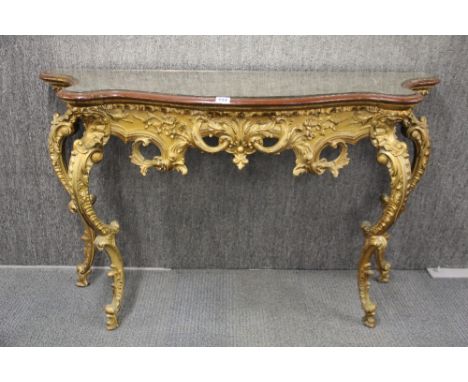 A impressive gilt resin and mirror top reproduction console table, W. 137 x 47 x 83cm.