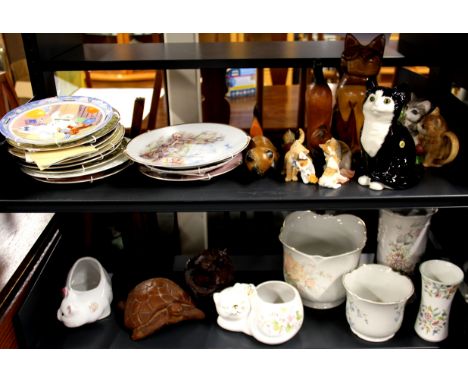 A quantity of ceramic, wooden and other cat and animal related items.