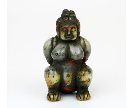 A Chinese carved jade/hardstone figure of a naked woman, H. 7.5cm.