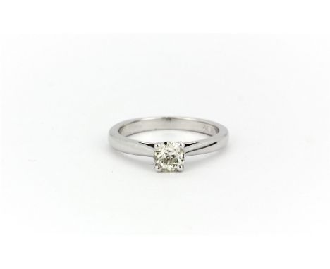 A platinum solitaire ring set with an old cut diamond, approx. 0.31ct, (J).