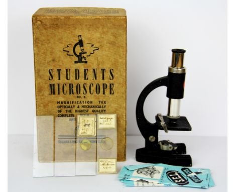 A boxed vintage students microscope, box length 19cm.