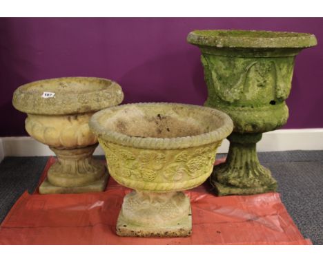 Three vintage concrete garden planters, tallest 52cm.