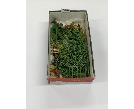 A box of mixed vintage plastic farm and Indian toys.