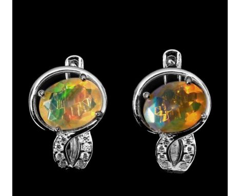 A pair of 925 silver earrings set with oval cut opal and white stones, L. 1.5cm.