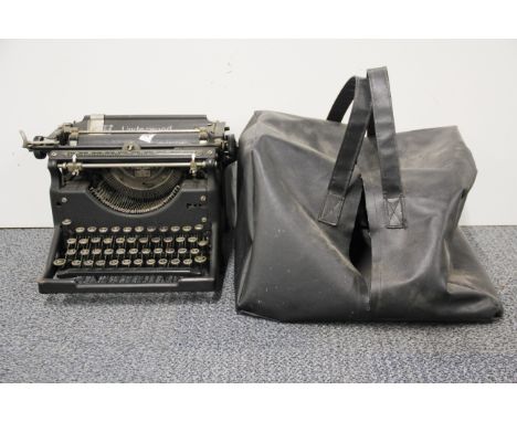 An antique Underwood typewriter.