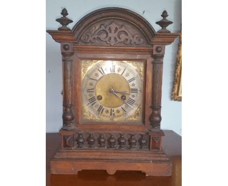 A Walnut Mantle Clock by Ganter of Dublin.