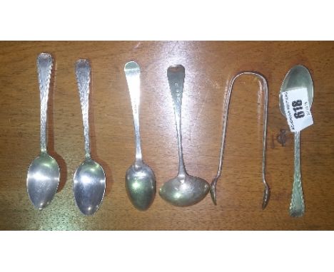 A Small Georgian Silver Sauce Ladle along with a Silver Tongs; along with a set of bright cut spoons.