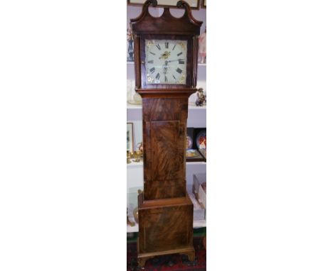 An Early 19th Century Mahogany and Crossbanded Longcase Clock; the painted square dial having date aperture, the hood with sw