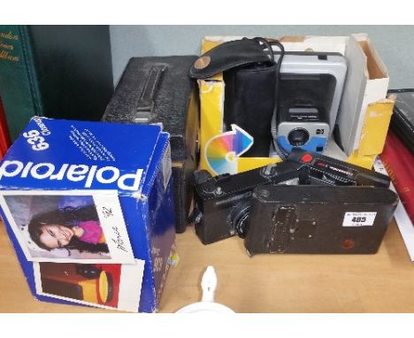 A Quantity of Cameras to Include a Polaroid Example and an External Flash Unit, (x8).
