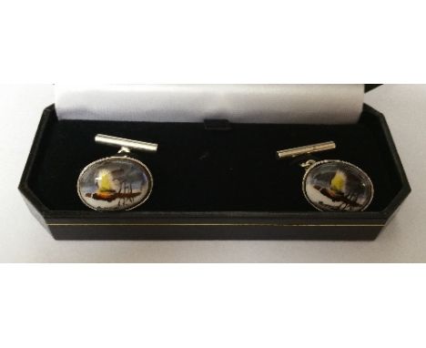 A Pair of Silver Enamel Duck Cufflinks.