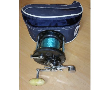 A Vintage Penn Delmar Fishing Reel, model no;285 along with a carry case.
