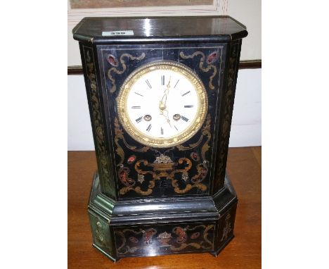 A 19th Century French Ebonised Boulle Brass Inlaid Mantel Clock; the white enamel dial with Roman numerals.