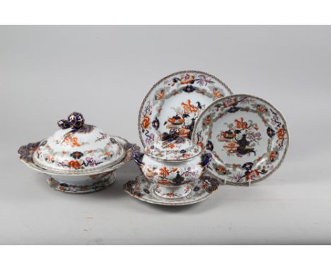 A 19th century M &amp; R Ironstone "Imari" pattern part dinner service, including sauce, tureen and vegetable dishes 