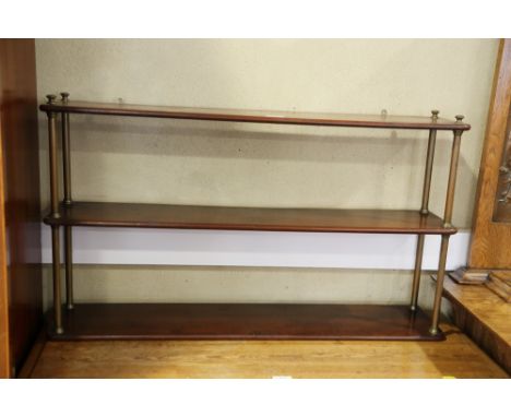 A 19th century mahogany and brass three-tier open wall shelf, 36" wide x 7 1/2" deep x 20 1/2" high 