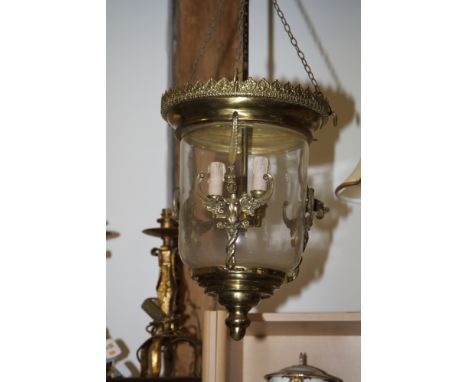 A brass lantern of Georgian design with griffins, 19" high 