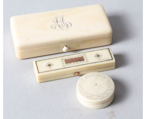 A 19th century ivory three-division stamp box, 3" wide, an early 19th century ivory and yellow metal inlaid toothpick box, 2 